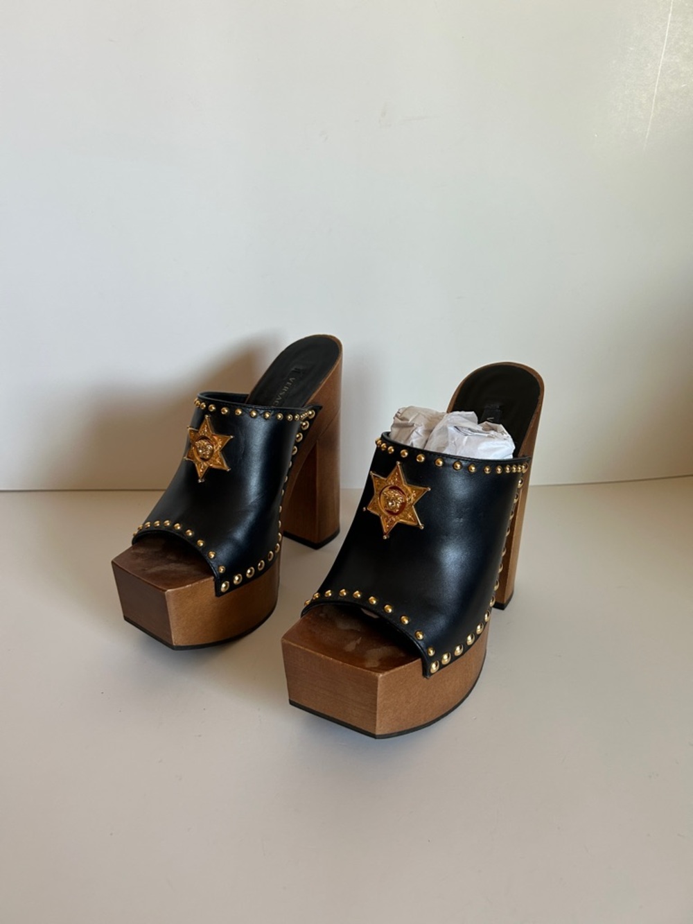 Versace Black Leather Platform Mules with Gold Star Medallions